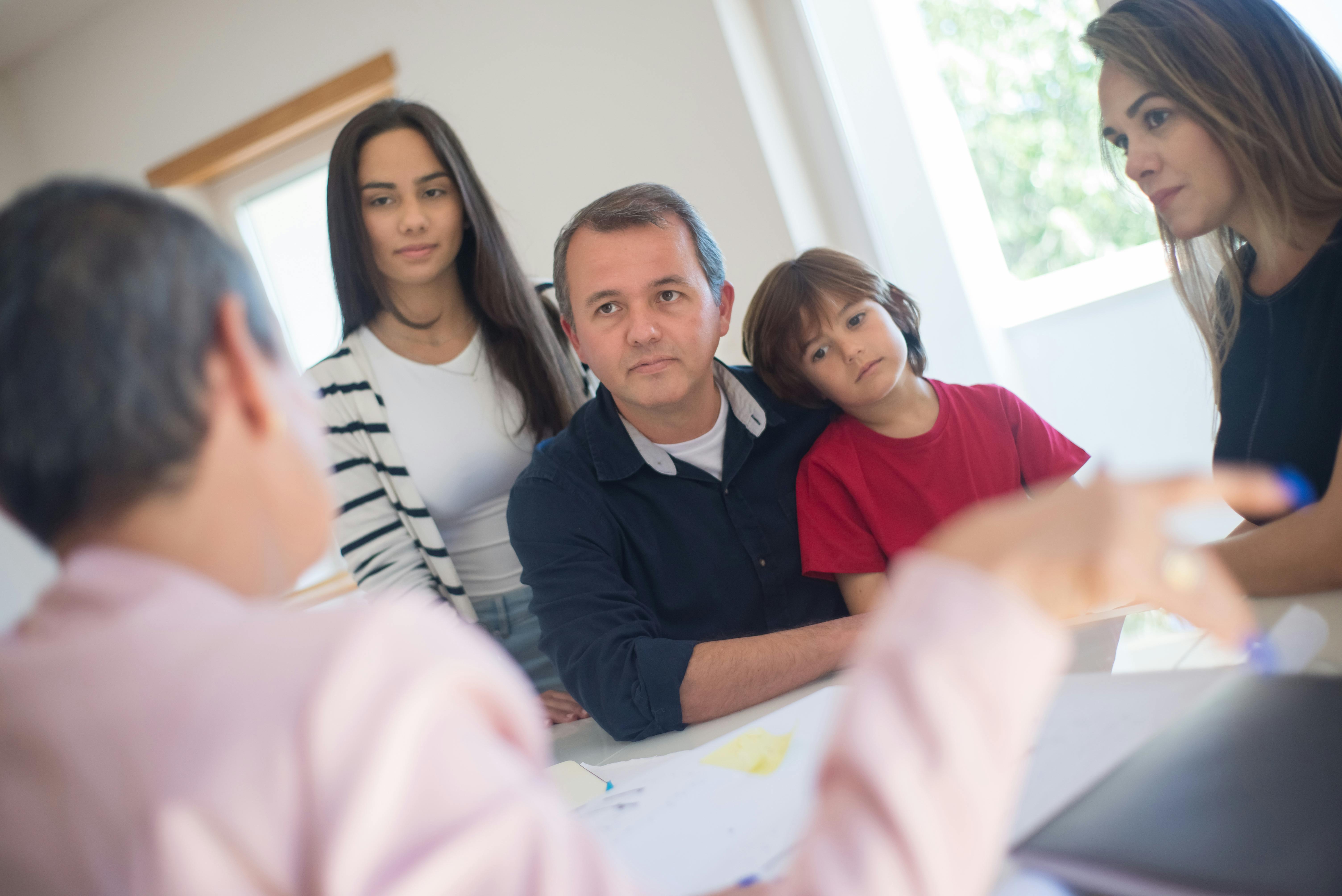 Family discussing financial planning